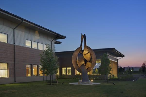 Vital Balance sculpture at dusk.