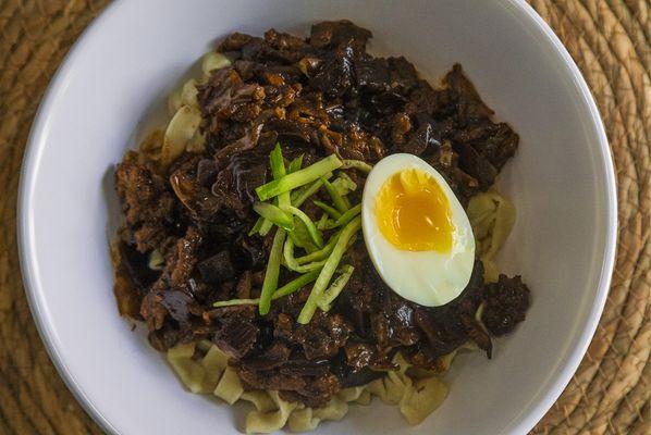 Hand-pulled Pasta/Steamed rice with Korean-inspired black bean sauce including: beef, vegan meat, or no meat