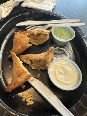 Samosas were amazing!! We cut them in half to cool before we ate them. Green sauce was on point!