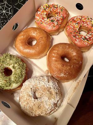 Matcha, glazed, pink sprinkles, cookie butter crumble, glazed, pink sprinkles