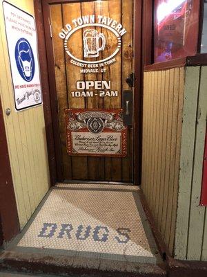 "DRUGS" at the front door. It's been there since it was a pharmacy before years ago.