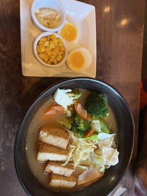 Veggie ramen Spicy with Corn, Garlic and soft boiled Egg on the side