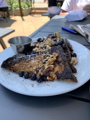 BRIOCHE FRENCH TOAST candied walnuts, maple syrup, powdered sugar with a daily topping . This one with walnuts and blueberries! Delish!