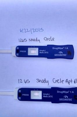 Preliminary meth tests for both properties rented by Barry Ward at 1265 Shady Circle. Both are positive, two lines like a pregnancy test.