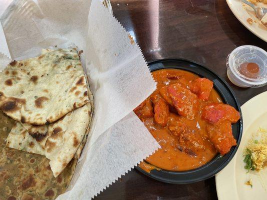 Several kinds of naan and lamb masala