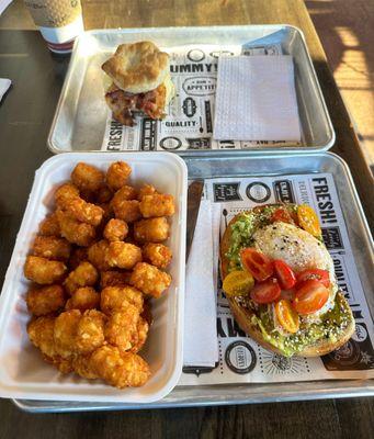 New Hartford with Bacon breakfast sandwich, large tater tots and classic avocado toast with a fried egg.