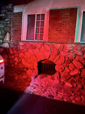 Is that a prison window under this house?  Lol.  Never seen a vent or access underneath a house like this before. Kinda Creepy!!