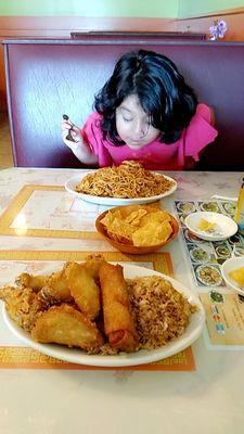 Chicken wings with pork fried rice and a spring roll for me and chicken love mein with no vegetables as well for my daughter