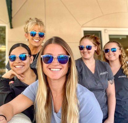 Back office team wearing their Elk Grove Ortho  shades.  Summer 2022