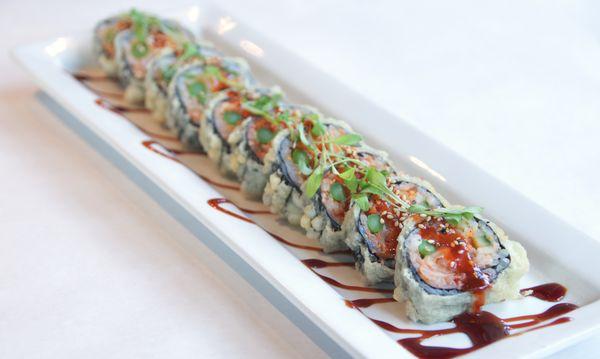 Kim Jong Roll-shrimp tempura, kimchi, cucumber, asparagus, deep fried with korean bbq sauce.