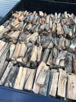 Firewood deliveries come stacked in the truck to provide true measurements. This was 2 cords of wood prepared for delivery!