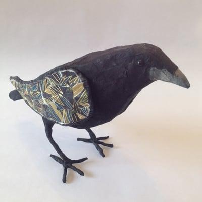 Paper mache raven by local artist.