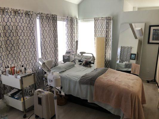 Very large Treatment room with vaulted ceilings and  beautiful new linens and blankets ultra double wide table  the most comfortable