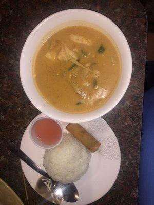 Yellow curry with chicken and vegetables.