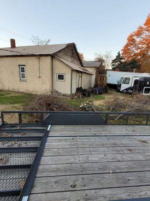 Cleaning and landscaping of these two building our client owns. Removing of all the vines grown on his buildings.