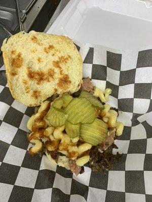 Randy Rogers sandwich - brisket, sausage, Mac & cheese topped with our homemade bbq sauce