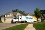 Crown Worldwide Moving and Storage - United truck pulling up to home