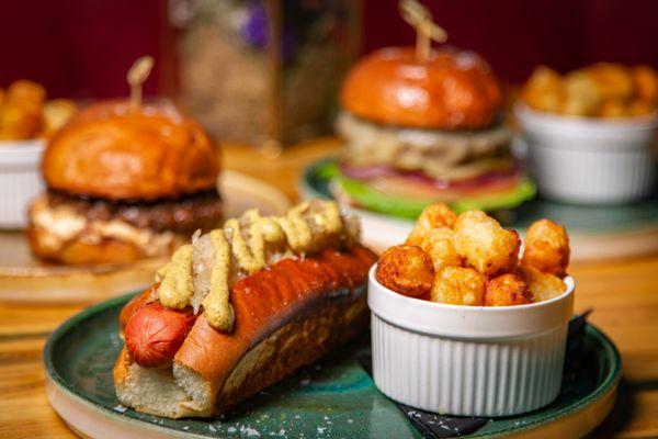 The  glitzy, 1/4lb all beef host dog, on a brioche new england roll, topped with sauerkraut and brown mustard.  Revelry, Pompano Beach