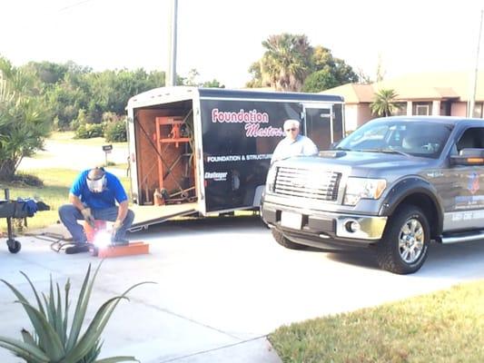 Jeff Earl welding together a grout injection peering system for a sinkhole and foundation repair project in Florida