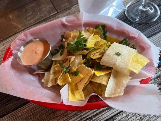 Plantain chips with mayo ketchup!  It came for the table and wasn't even a purchased appetizer! Love this!