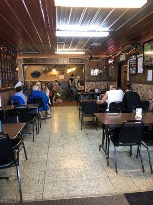 Clean dining room with a lot of local character