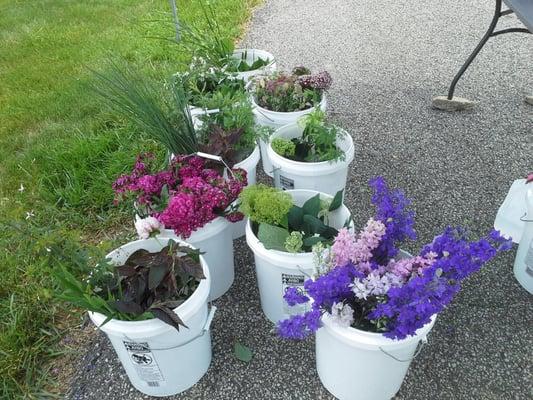 Fresh flowers and produce available at our seasonal farmer's market.