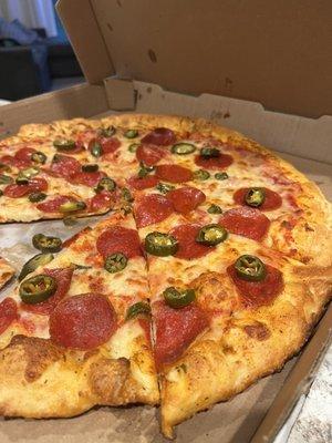 Medium pepperoni and jalapeño pizza