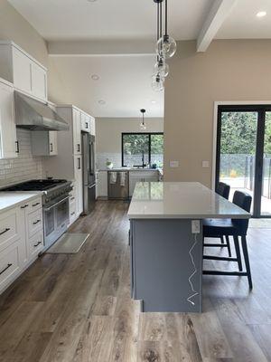 Kitchen remodel, bifold door, black windows