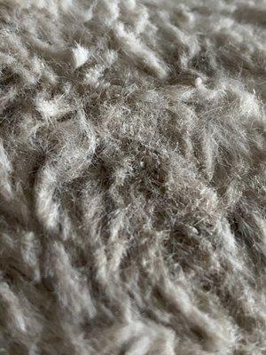 Matted soap on blanket