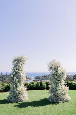 All-white textural deconstructed flower arch for Lindsey at the Montecito Club