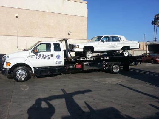 Lowriders, yes we tow those also, nothing is too hard for us to tow.