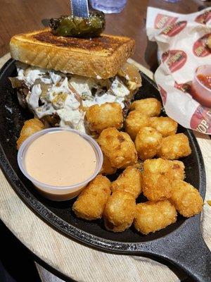 Jalapeño cream cheese burger with tots