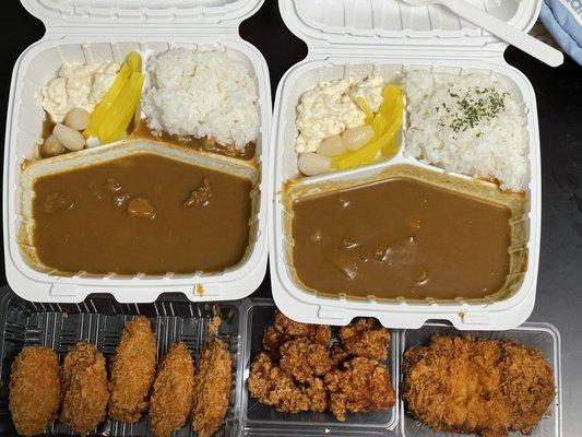 Oyster curry, fried chicken curry and side of tonkatsu