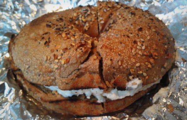 Whole wheat everything bagel w/ garlic and herb cream cheese.. SO good.