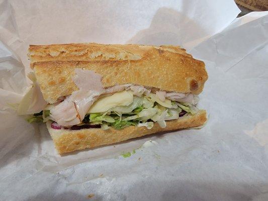 Turkey Sandwich with avocado Monterey Jack Cheese, onions, & Avocado