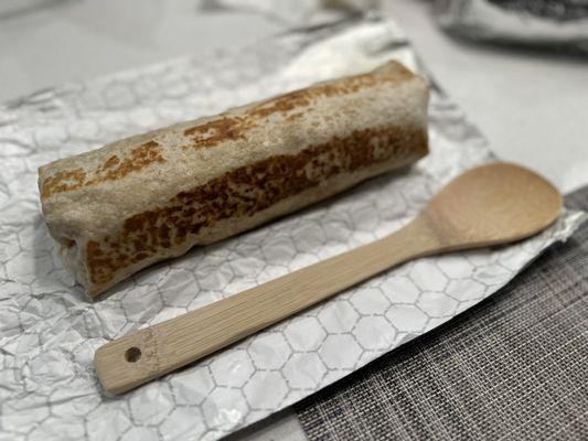 Beef Shawarma wrap compared to my wooden spoon.