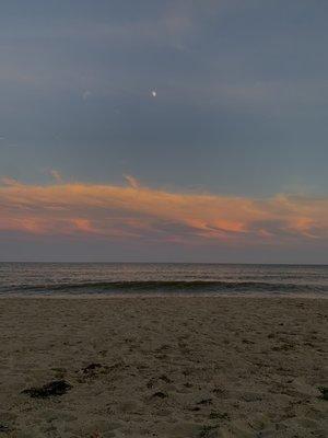 Beautiful sunset at the beach accessible from the summer house bistro.