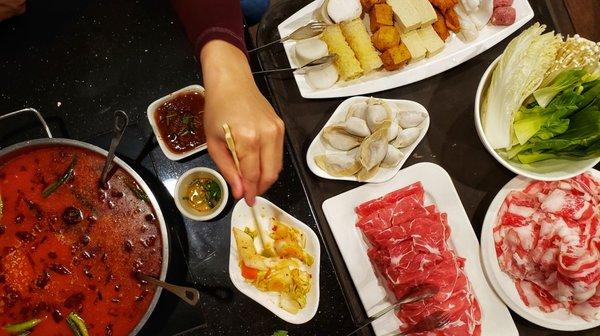 Spicy Broth, Lamb, Fatty Beef, Pickled Cabbage Starter, Daikon, Tofu Skin, Fish Cake, Fried Tofu, Dumplings, Frozen Spongy Tofu