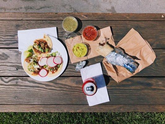 Carnitas tacos  and Al Pastor Burrito  definitely recommend getting sour cream on the burrito.