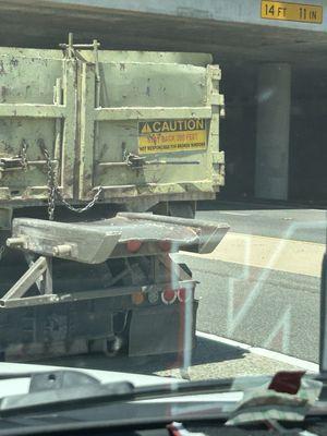 Another angle of them leaking rocks and dropping them onto the road. The sign of state two 200 feedback which I was very far back.