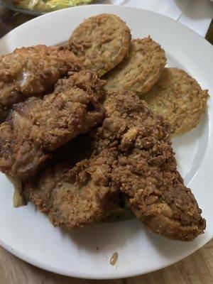 Fried pork chops with rice and fried green tomatoes