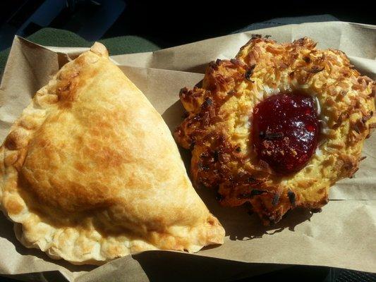 Pumpkin empanada and coconut strawberry thumbprint something.