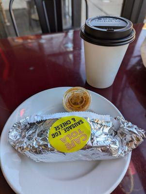 A latte and a Cafe Tola taco