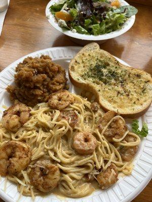 Blackened shrimp Monica with sweet potato casserole, French bread and a side salad