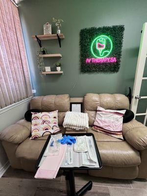 A welcoming and cozy clinic space featuring comfortable reclining chairs, soft lighting, and a clean, relaxing atmosphere. Designed with car