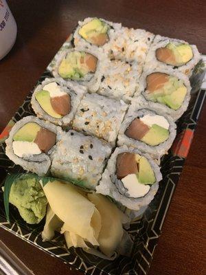 Bottom: Philadelphia Roll Top: Alaska roll  Lunch special.