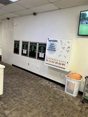 Plenty of change machines, and dispensers for detergent, fabric softener and fabric sheets.