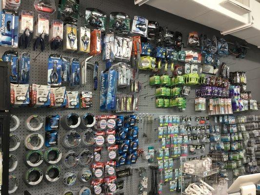 Fluorocarbon Leader, Hooks, Pliers, Reel's, yellowtail jigs candys, Swivels,sabiki sand much more on this wall