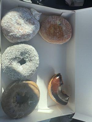 Half dozen...raspberry filled, vanilla cream, chocolate coconut, blueberry, and half a chocolate glazed