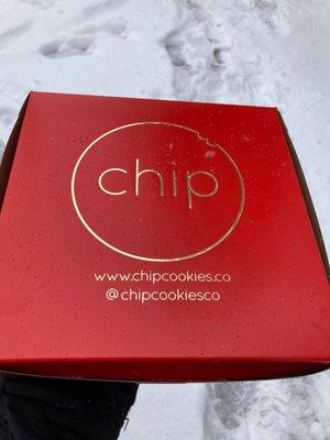 Chip cookie box with our goodies inside.